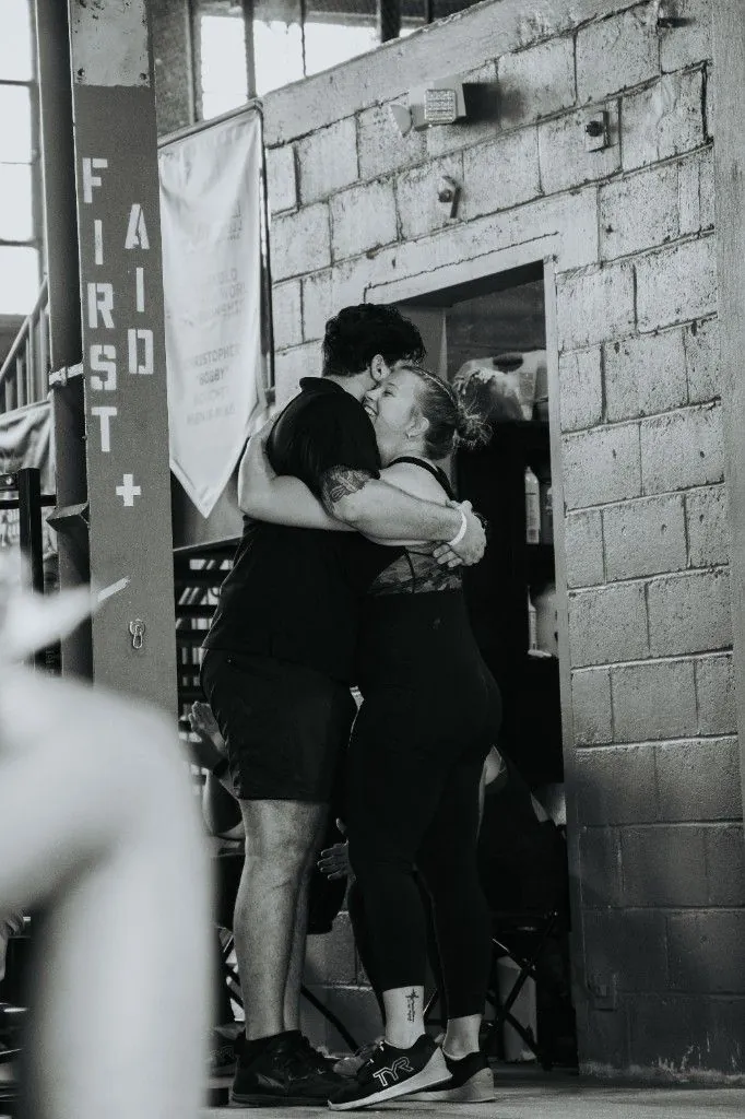 Sean and Kylie celebrating her personal record